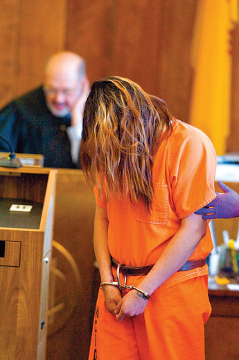 Marissa Yazzie hangs her head during her sentencing for the murder of Colleen Lincoln on Tuesday afternoon. The hearing was continued to another date. © 2011 Gallup Independent / Brian Leddy 